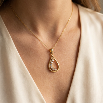 elegant-yellow-gold-teardrop-openwork-charm-pendant-for-women-on-model-1-330x330